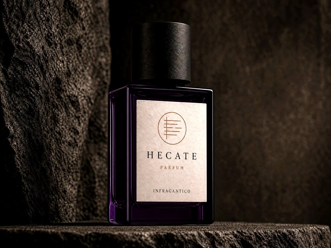 Hecate — deep purple glass bottle with bone label and the Infragantico seal, on dark stone